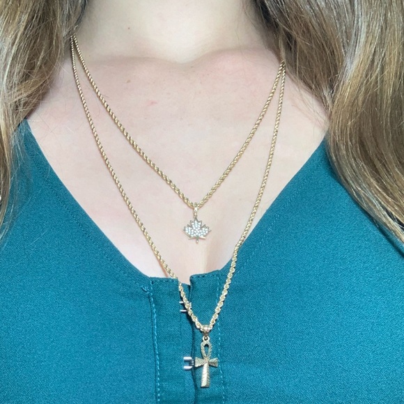set of gold chains with pendants